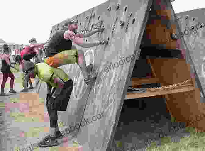 A Group Of Runners Crossing A Muddy Obstacle During A Spartan Race Spectacular Sports: World S Toughest Races: Understanding Fractions (Mathematics Readers)